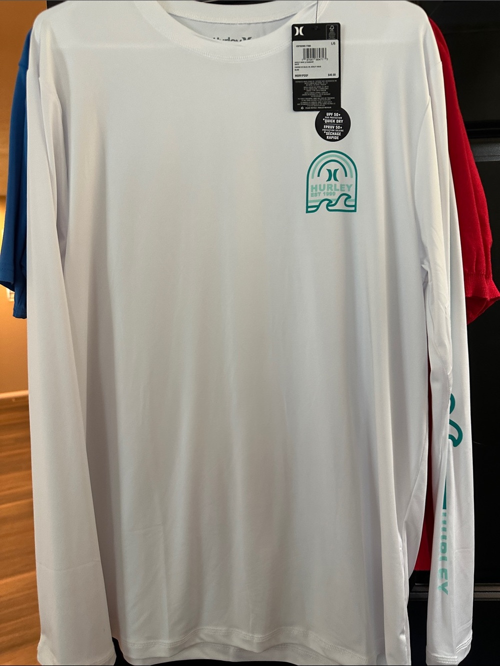 Hurley White Long Sleeve Tee with Teal Chest Graphic